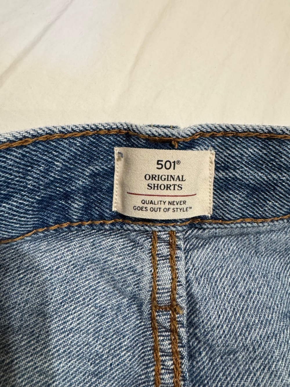 Levi's distressed light blue denim shorts